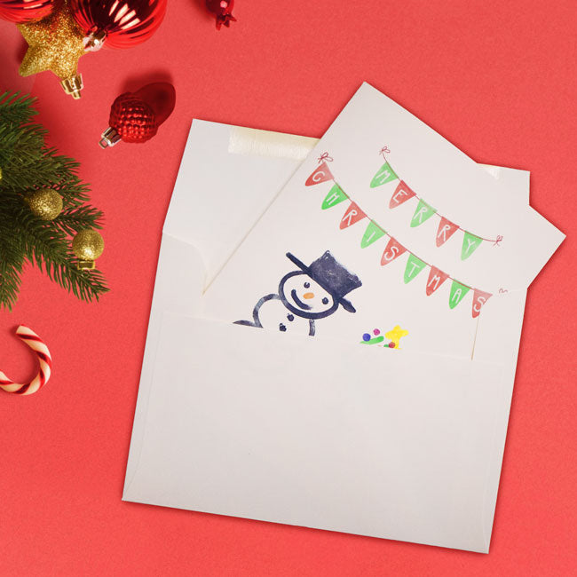 Snowman and Tree Greeting Card by Prime Retreat